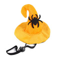 Embroidered cloth pet Halloween hat showing pumpkin design on cat