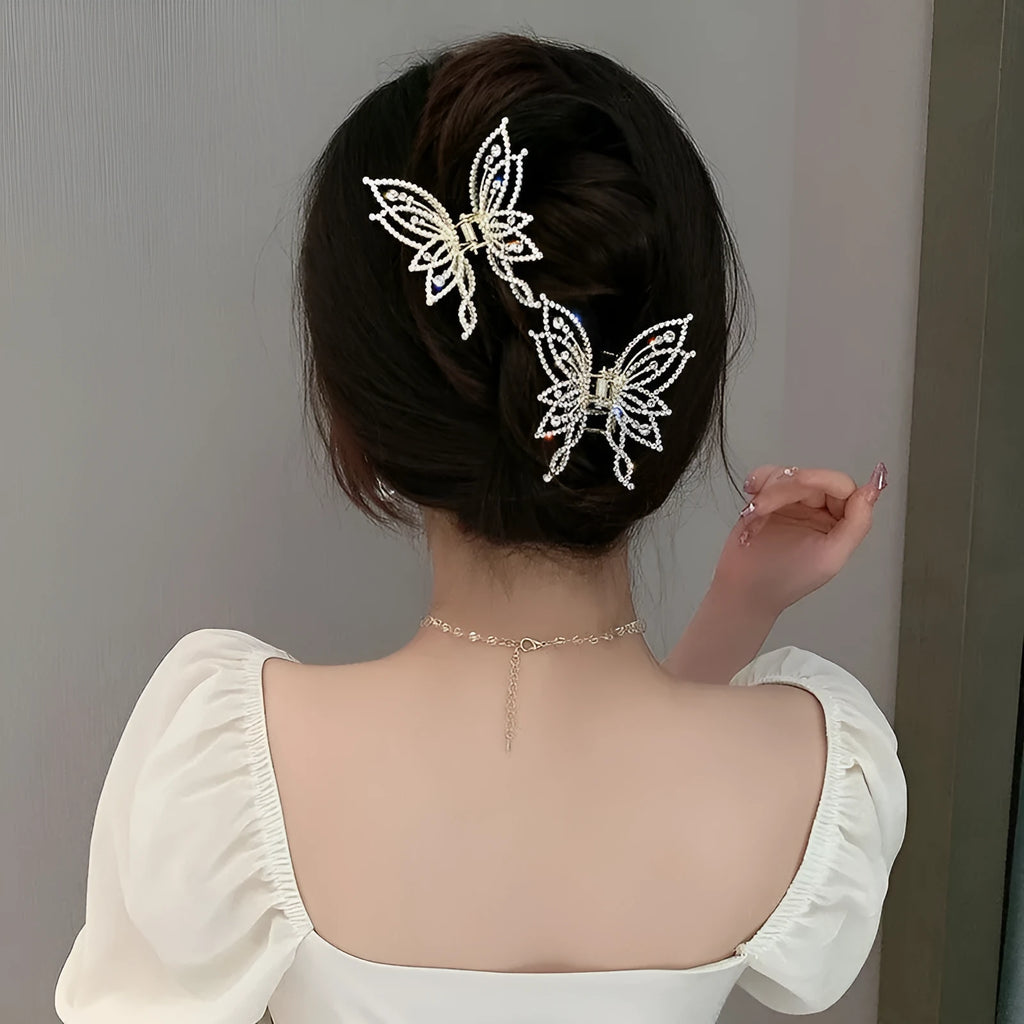Butterfly design alloy hair barrette with electroplated finish measuring 6.7x6.2cm