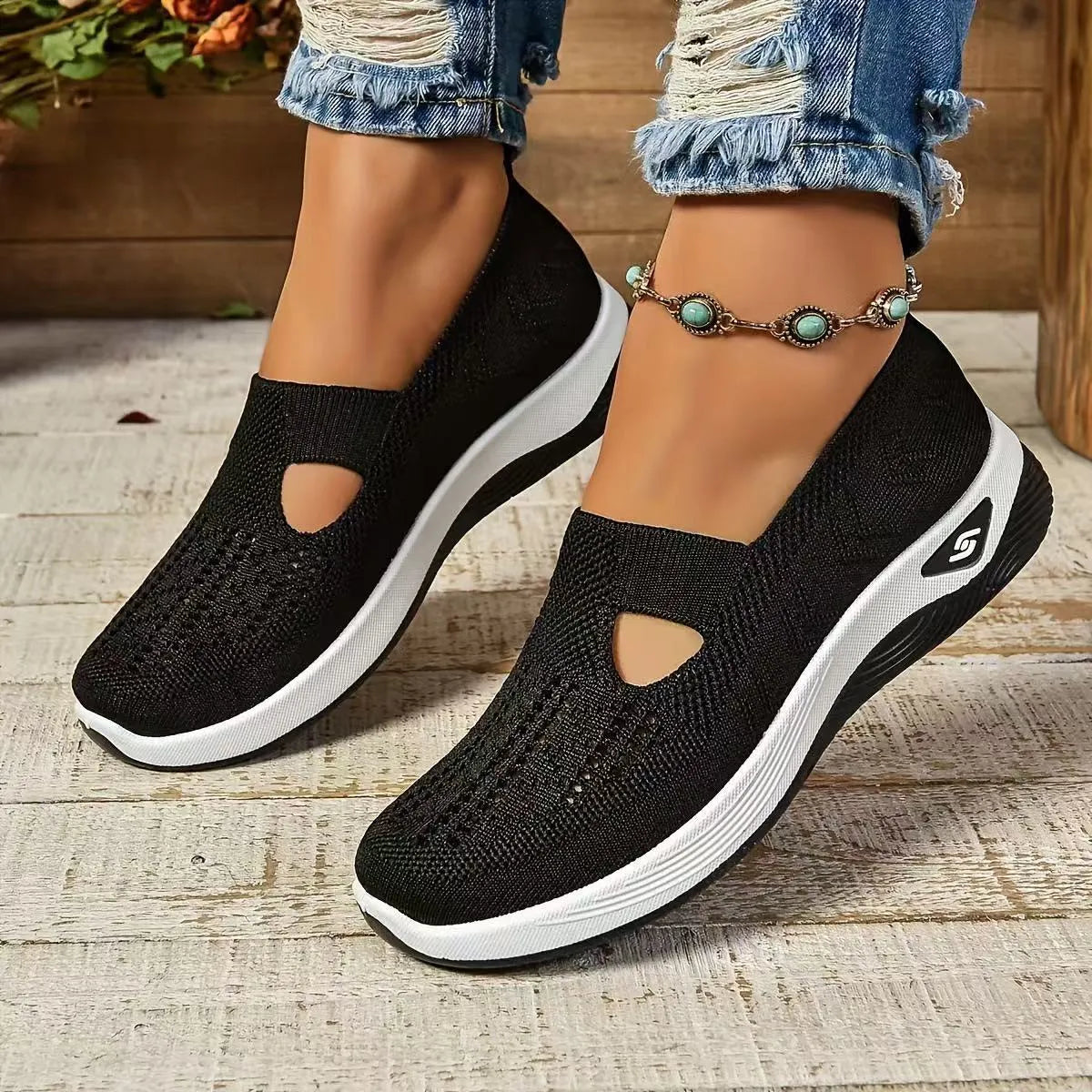 Women's soft sole casual mesh shoes with T-strap in various colours on a white background