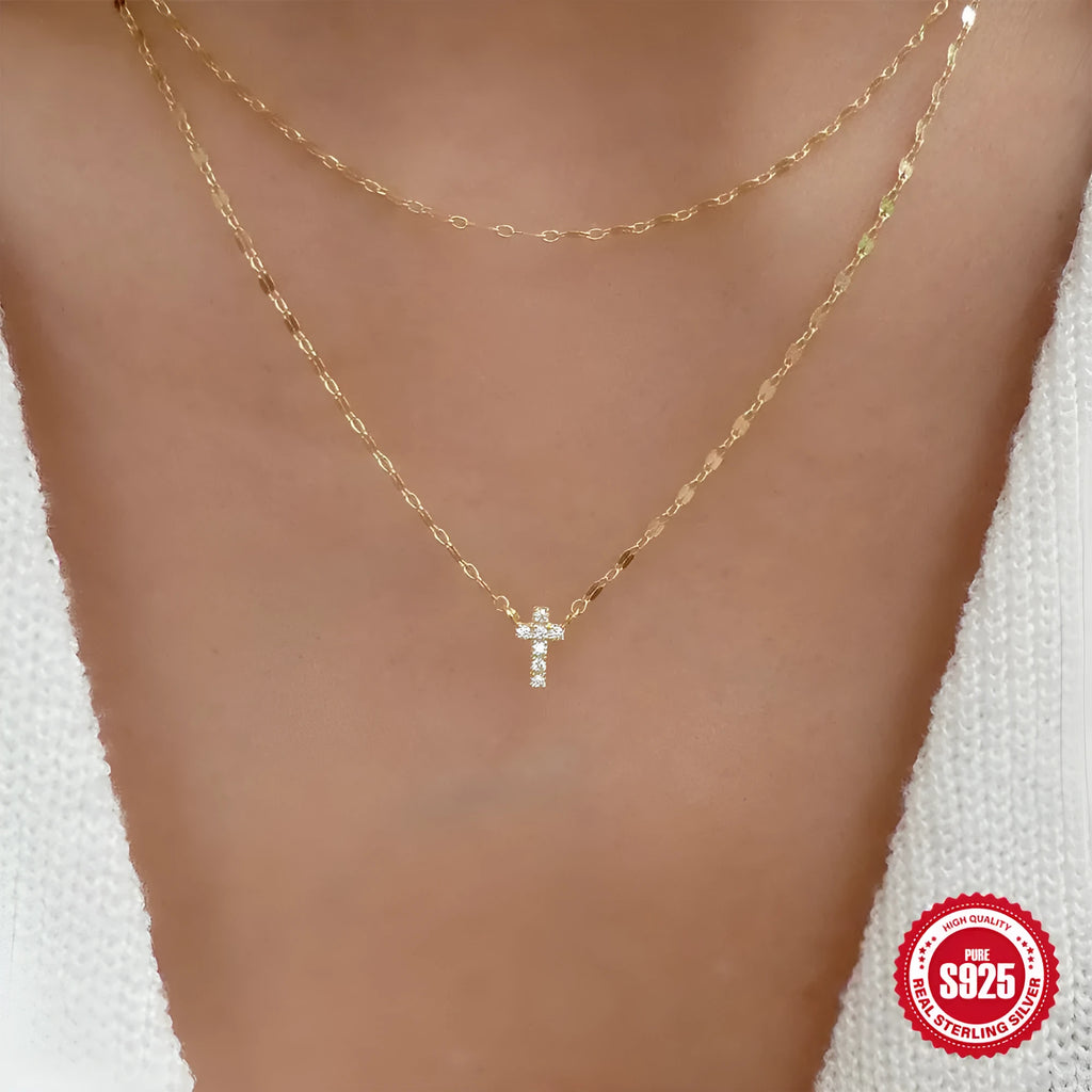 S925 sterling silver double layer geometric cross pendant necklace with twin diamond detail on a clavicle chain.