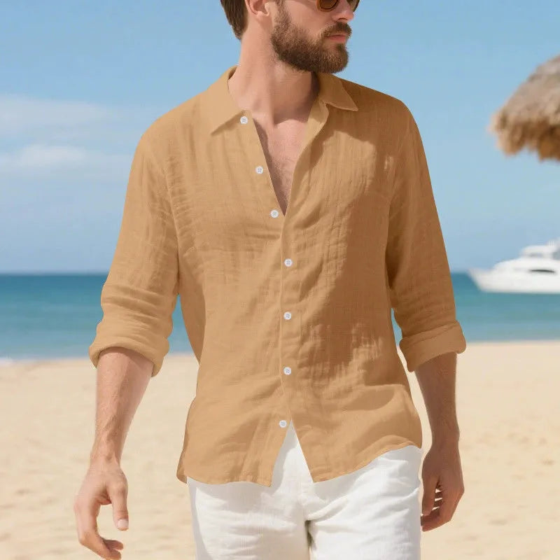 Man wearing a loose-fit light blue linen casual shirt with short sleeves