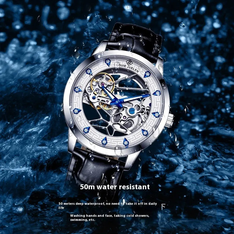 Men's silver-cased mechanical watch with white dial, blue hands, black leather strap, and butterfly buckle.