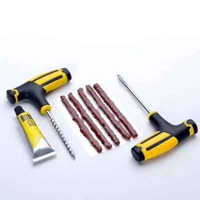 Vacuum tire repair tool kit with rubber strips, adhesive, and insertion tools for motorcycle and automobile puncture repair