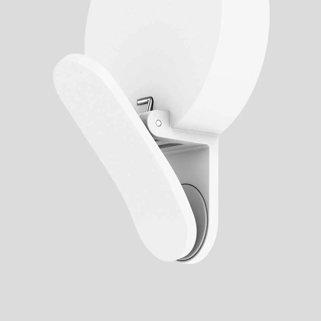 Compact white selfie fill light for mobile phones with three-level dimming switch and USB charging port.