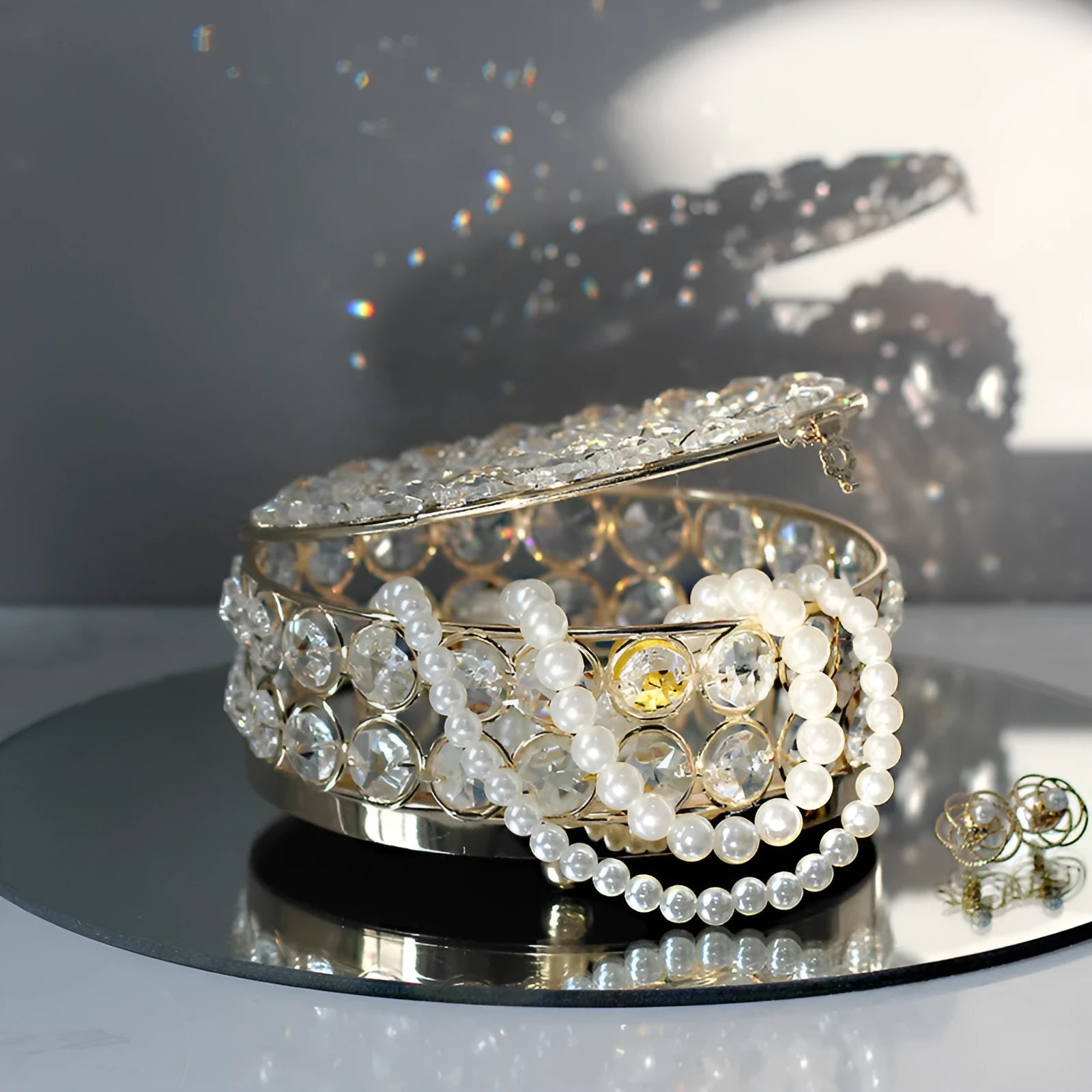 European-style French gold iron jewellery storage box with a transparent crystal glass lid.