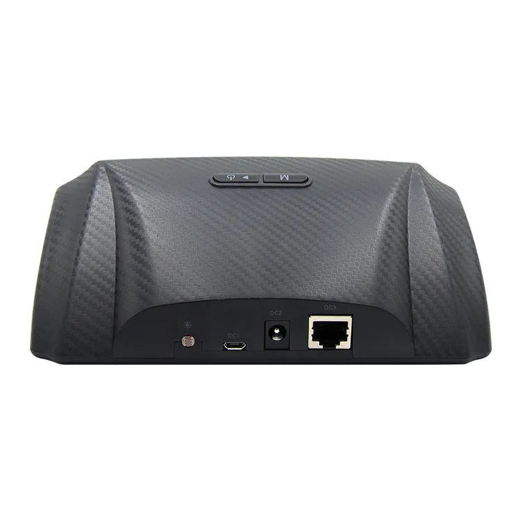GPS GO 2 universal car head-up display with carbon fibre body on a dashboard showing speed and gradient data.