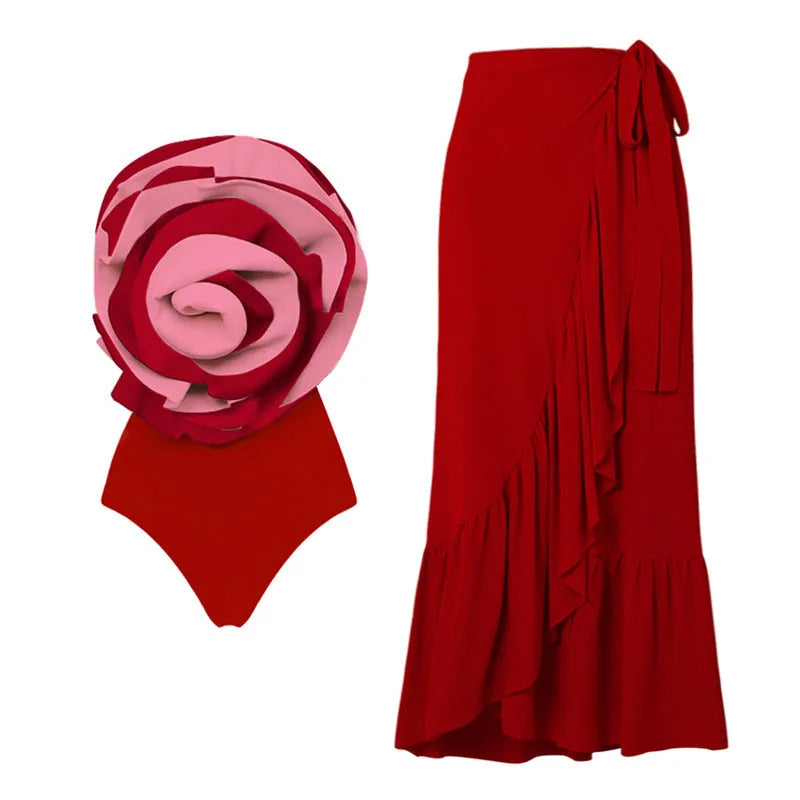 Women's black and white one-piece swimsuit with matching skirt shown beside red swimsuit version