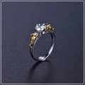 Black gold copper crown modelling ring for cosplay on a plain background.