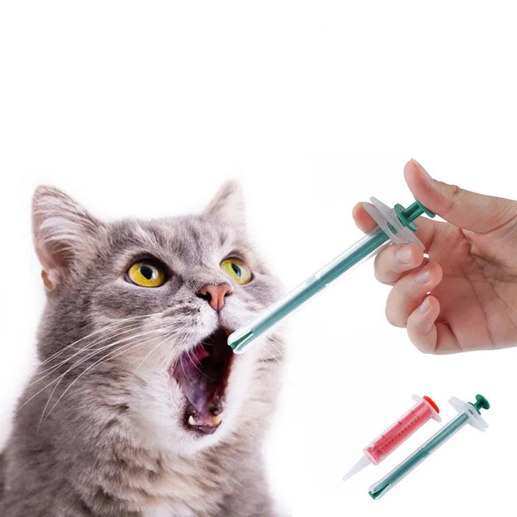 Two silicone pet pill shooters with soft tips for feeding medication to cats and dogs.