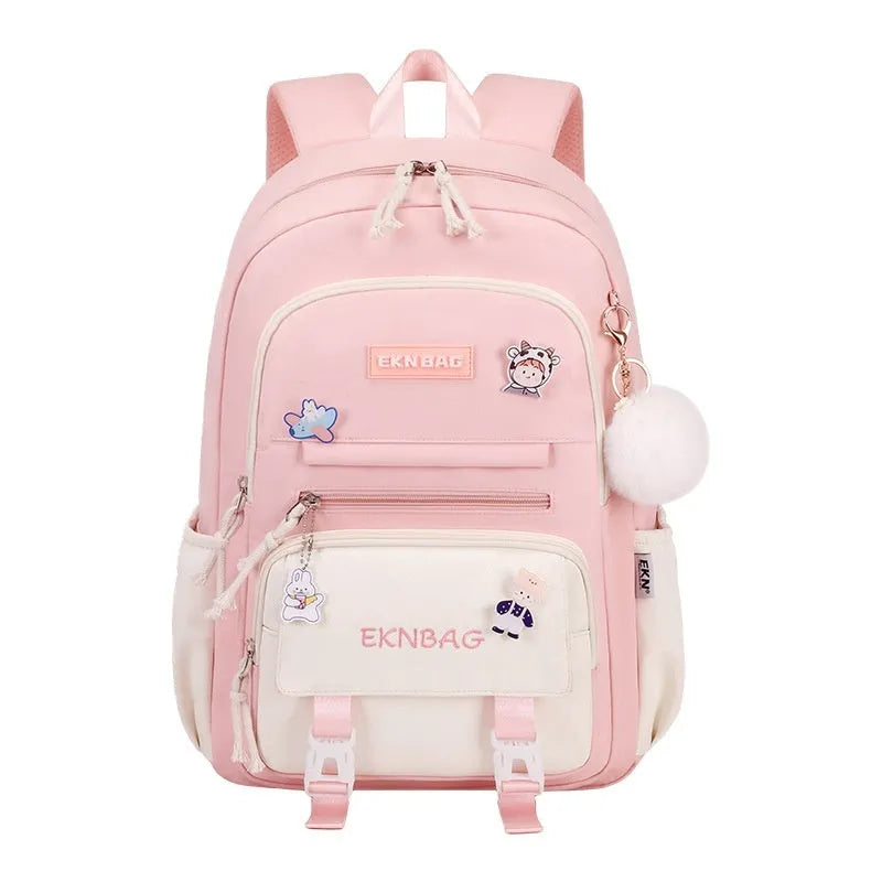 Pink waterproof Oxford cloth school backpack for girls with curved shoulder straps, shown with a matching pencil case.