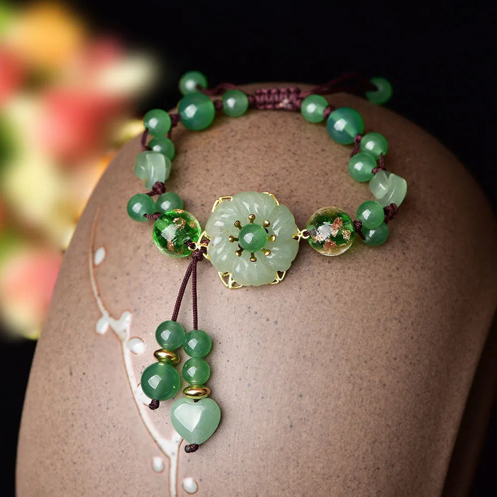 Hand-woven Chinese style bracelet with auspicious patterns and flower design in mixed materials