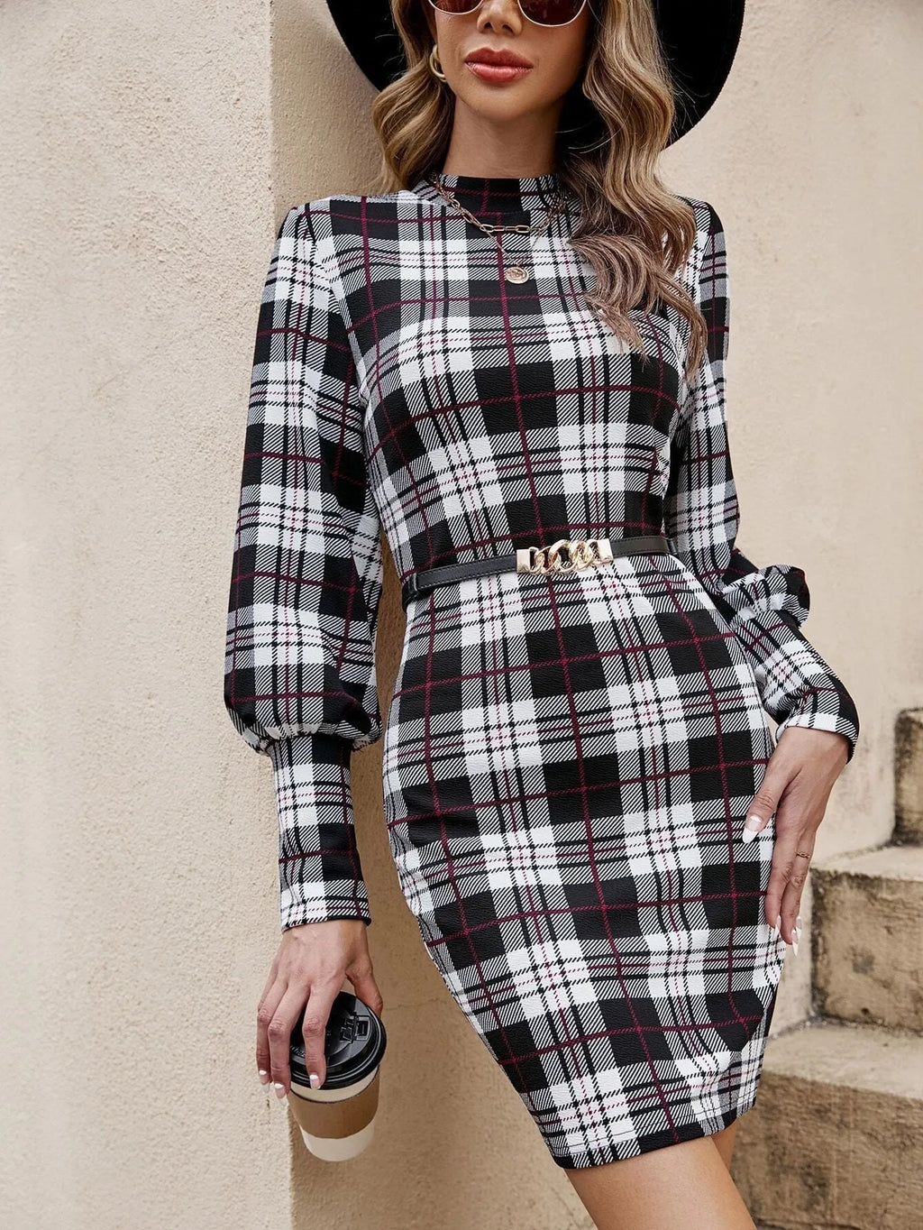 Black tight midi dress with lantern sleeves and printed design featuring leather stitching detail