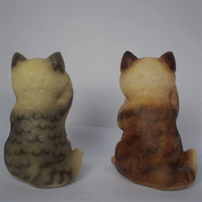 Brown or grey resin cat-shaped solar lawn light for garden and courtyard decoration.