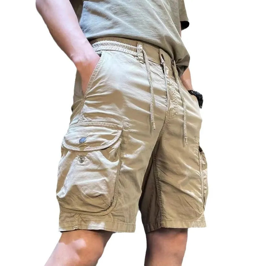 Loose straight-leg casual overalls in khaki with multiple pockets and a Korean-style fit.