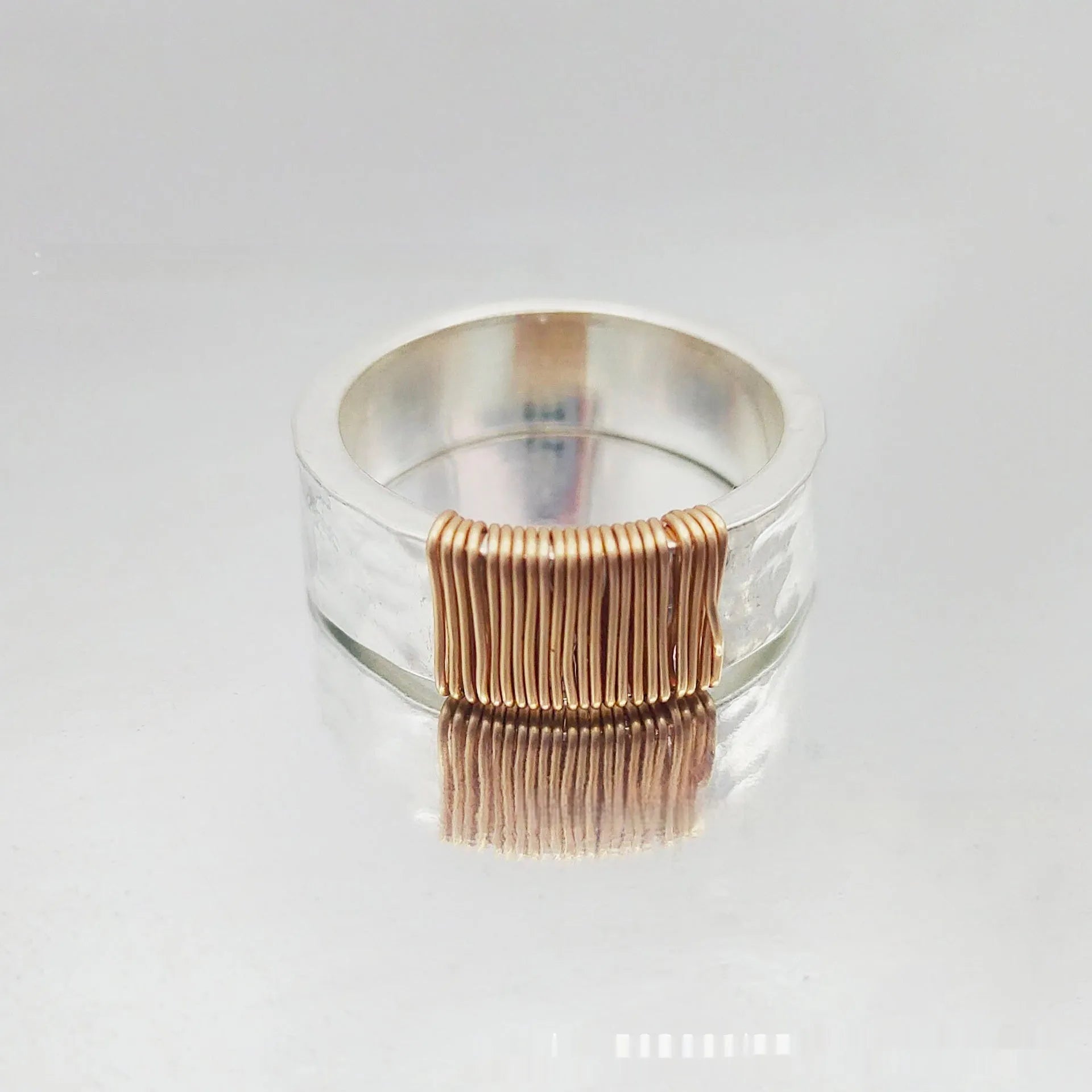 Copper wide face ring bracelet with geometric vintage coil design in silver gold colour.
