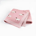 100x80cm grey and pink baby sheepskin blanket made from 100% cotton fabric laid flat.