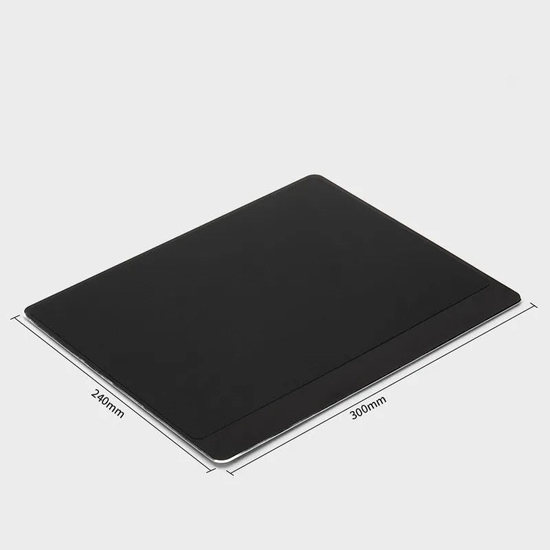 Alloy extended mouse pad in black on desk with keyboard and mouse, showing oversize surface