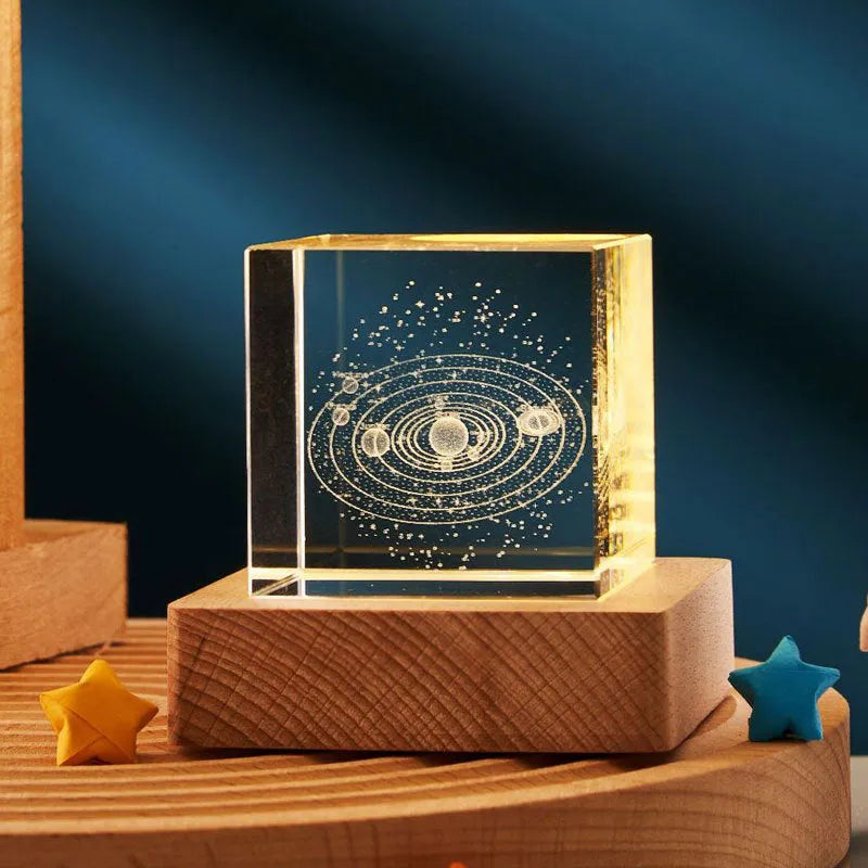 3D transparent crystal cube night lamp in 40mm or 60mm size on a desktop