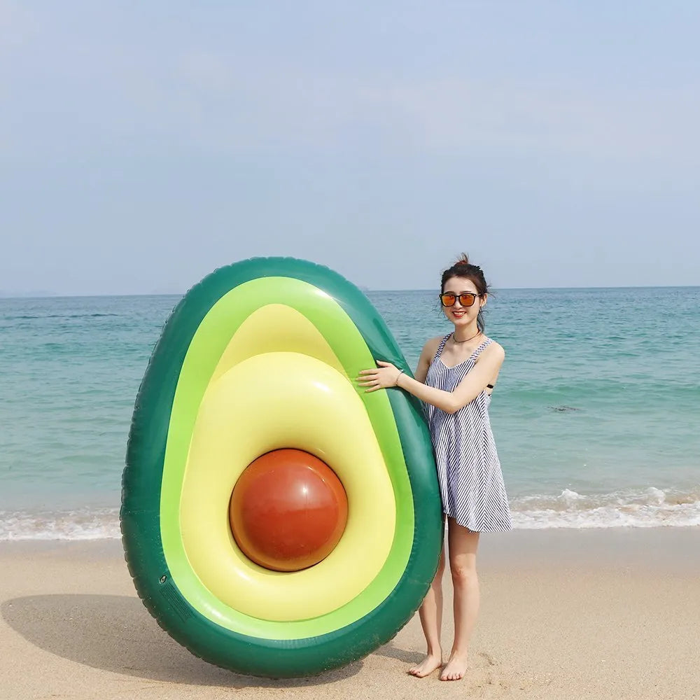Green giant avocado-shaped inflatable pool float on water