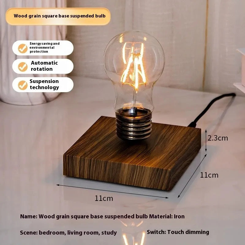 Creative small desktop night lamp with a suspension bulb and iron art body on a wood grain base.
