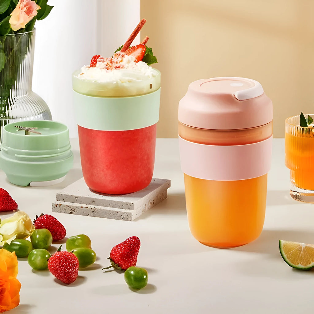 Portable 400ml blender juicer cup with four stainless steel blades in purple, green, or orange colours