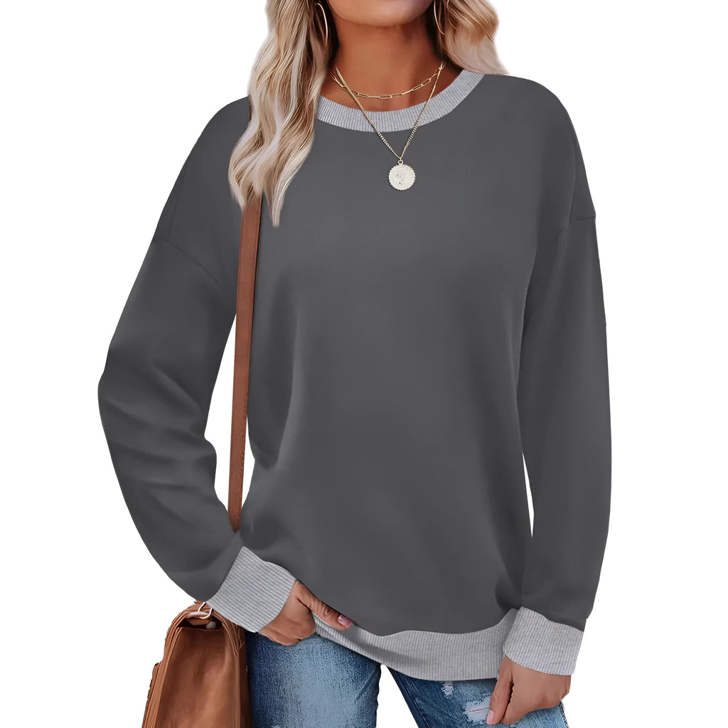 Women's loose striped long-sleeved top in polyester showing round neck and regular sleeve construction