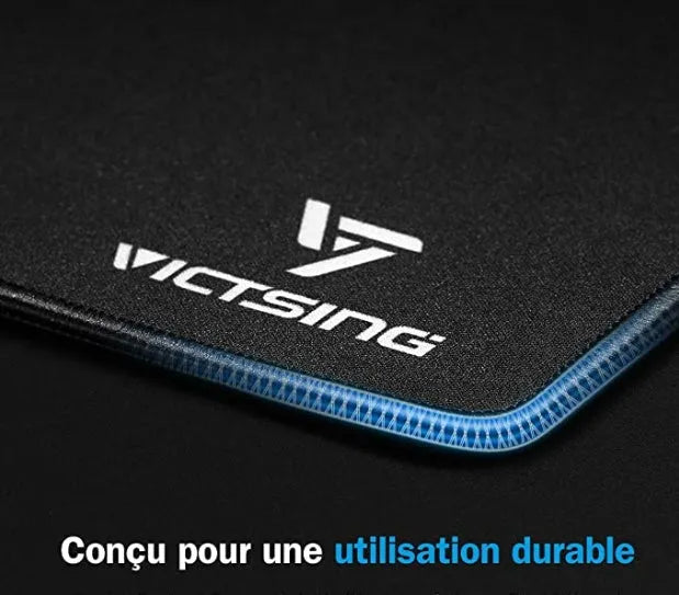 Black thickened rubber gaming mouse pad with rough grain textured surface measuring 270mm by 220mm