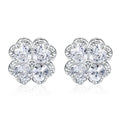 Pair of silver heart-shaped earrings with a four-leaf clover design and zircon stones in white gold colour.
