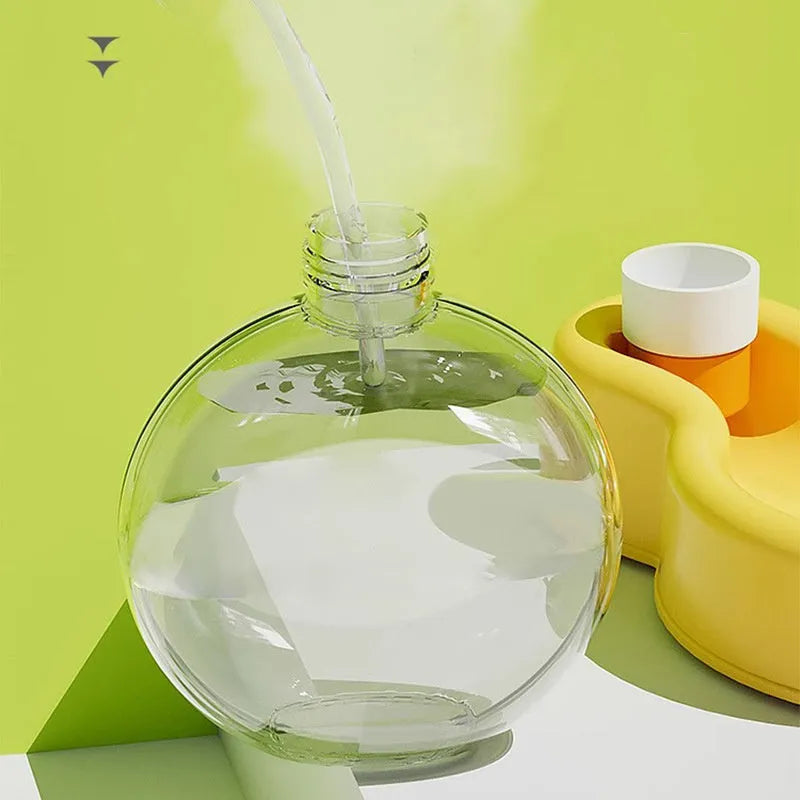 Green dog travel water bottle with integrated pull-out bowl and handle