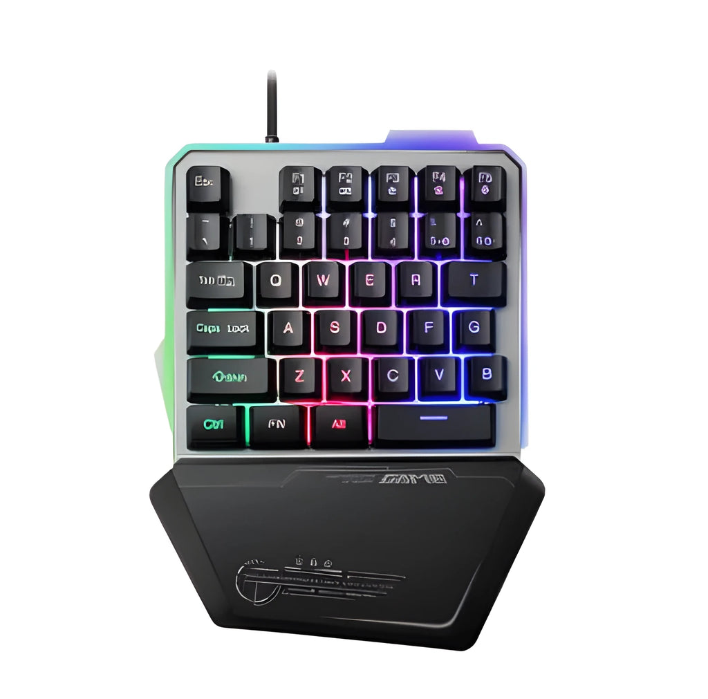 G40 Flow black one-handed robotic keyboard with RGB backlight on a desk.