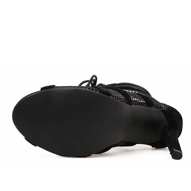 Black suede women's lace-up high heel shoes with an 11.5cm heel and 1cm front platform.