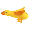 Yellow teddy dog toy with duck sound mechanism and food leak holes for treat dispensing