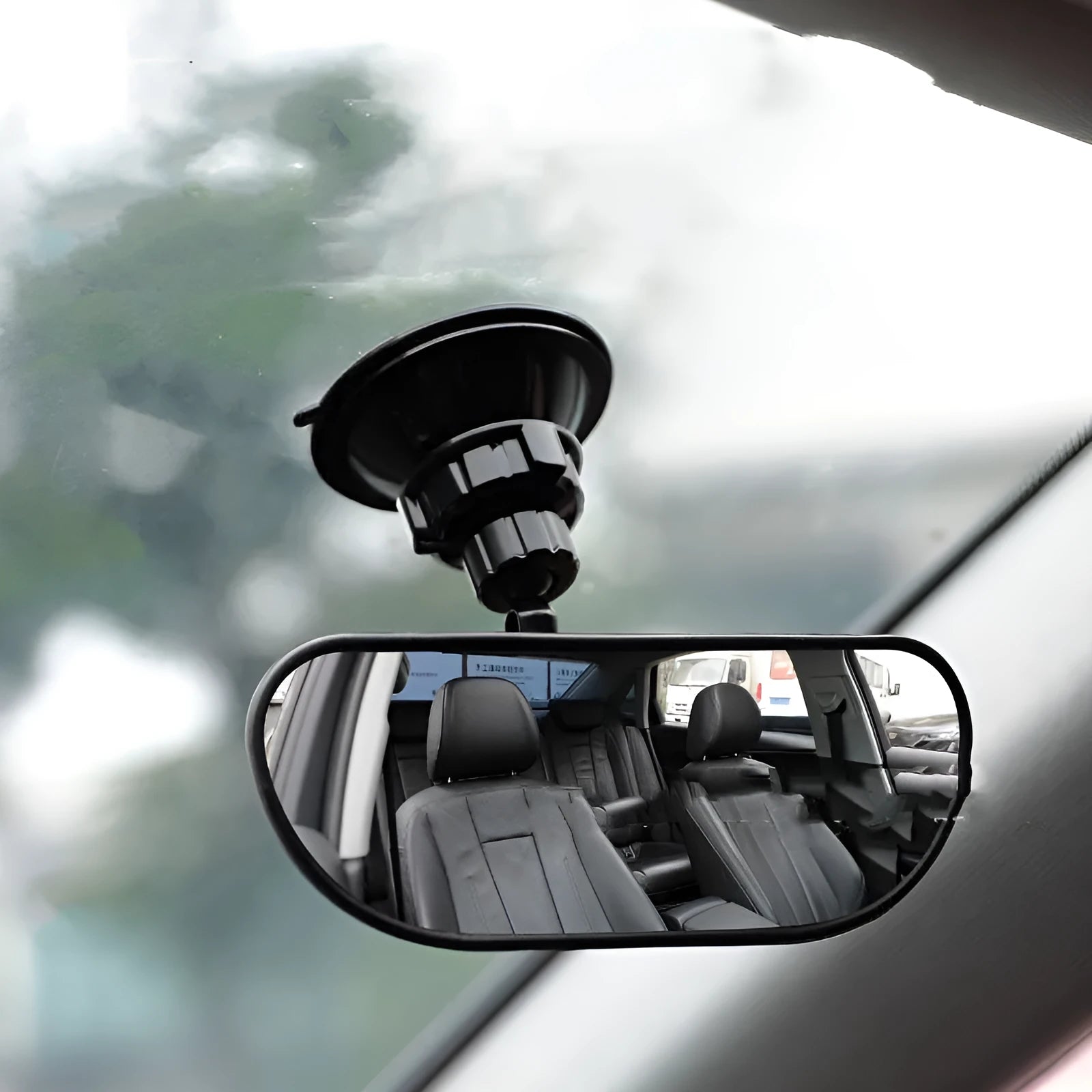 Black 360-degree rotating rearview mirror for cars shown with a large sucker mount for windscreen attachment.