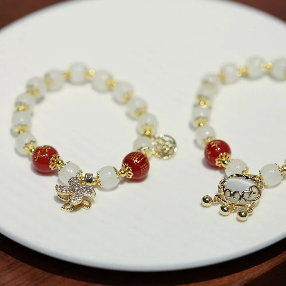 Women's Chinese style glass bracelet with Fu character and safety lock design in coloured glaze