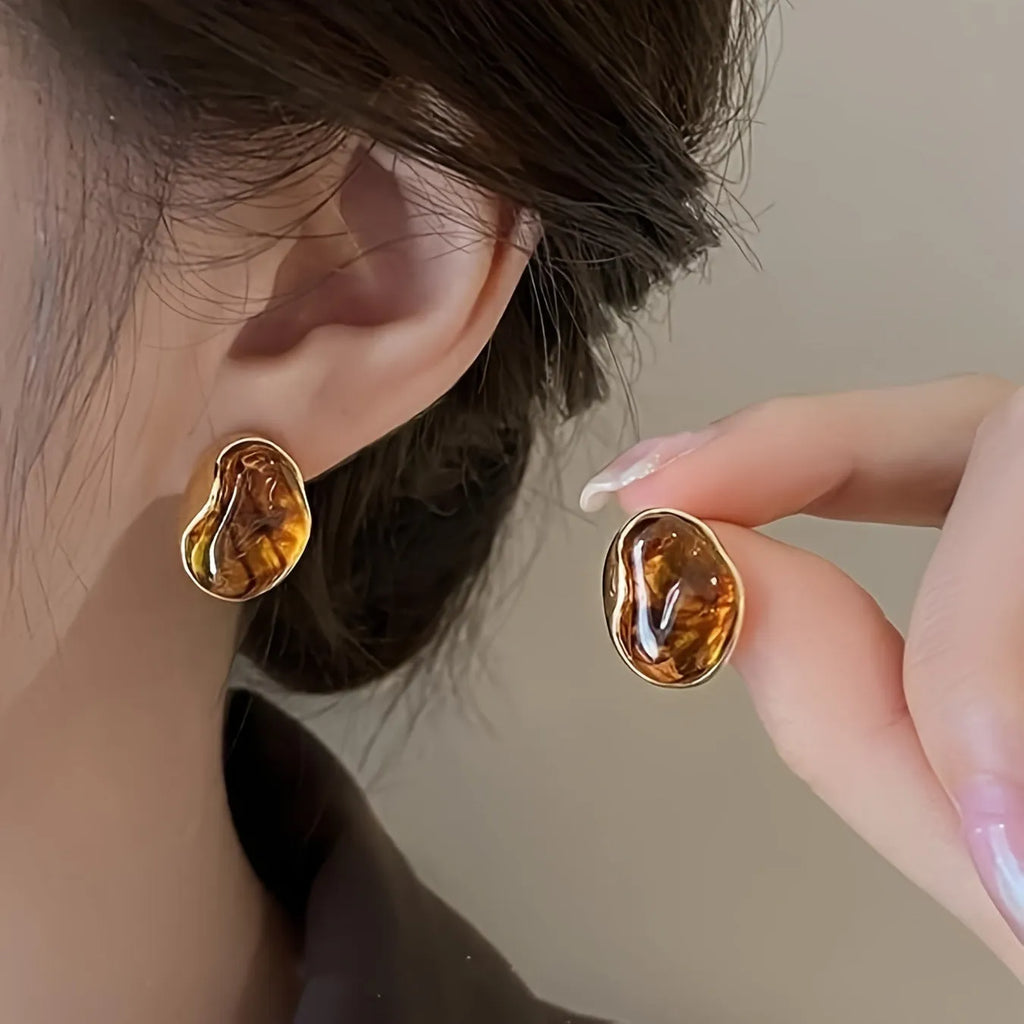 Three pairs of handmade electroplated alloy holiday earrings with geometric shapes and tassel elements