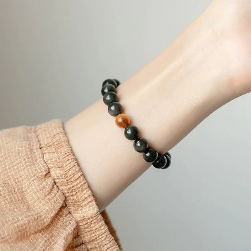 Black obsidian geometric bead bracelet in Korean style, showing size options.