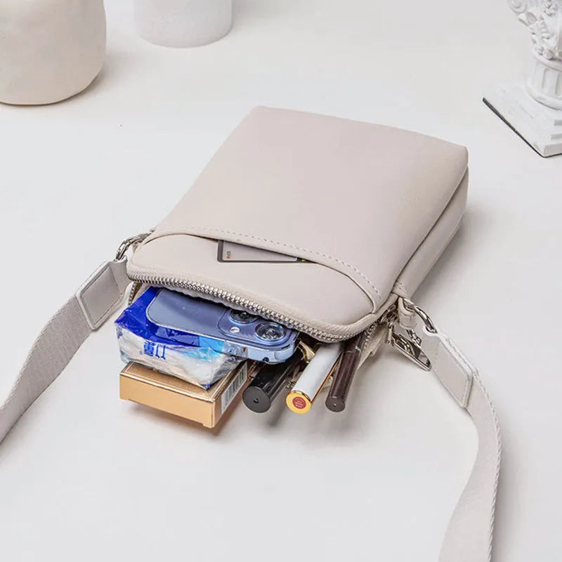 Small solid colour crossbody shoulder bag for women in beige, shown with dimensions.