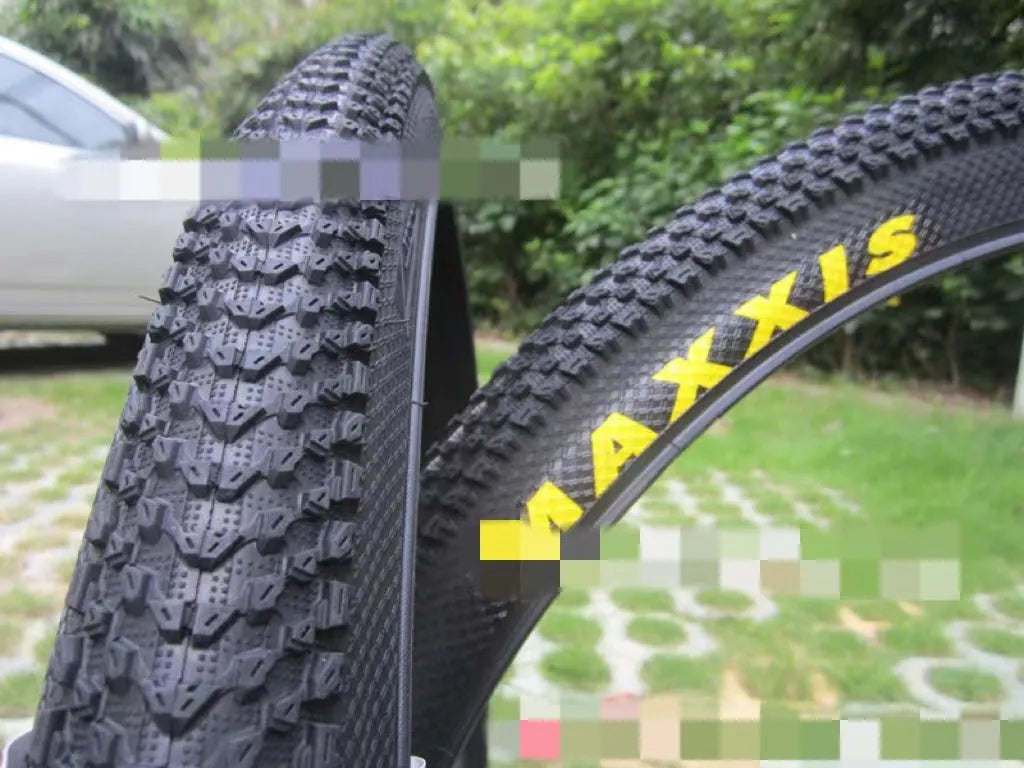 Mountain bike ultralight puncture proof tyre showing tread and sidewall, available in 26, 27.5, and 29-inch sizes.