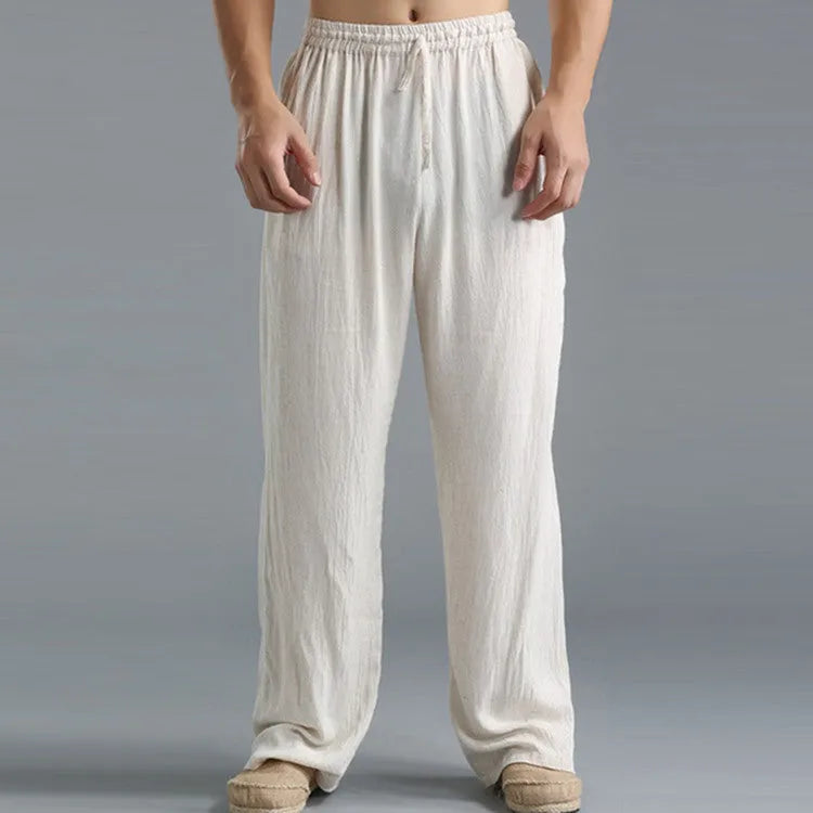Men's linen loose casual sports pants in khaki, side view, on a hanger