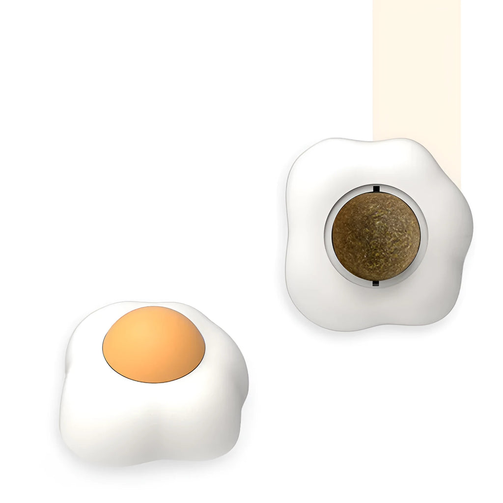 Soft plush egg-shaped cat toy filled with catnip and silvervine for wall and floor play.
