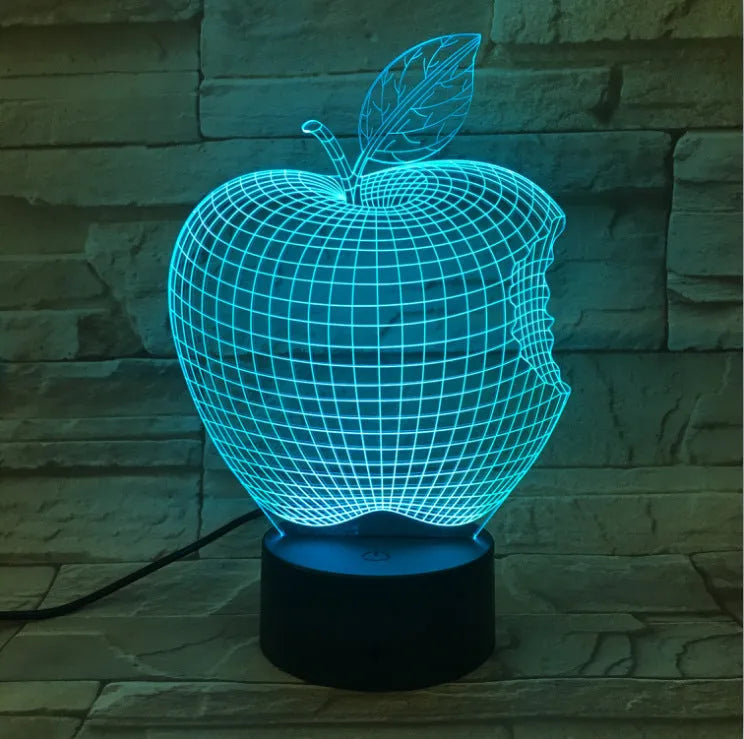 Colourful 3D fruit-shaped night light with acrylic shade and touch control.