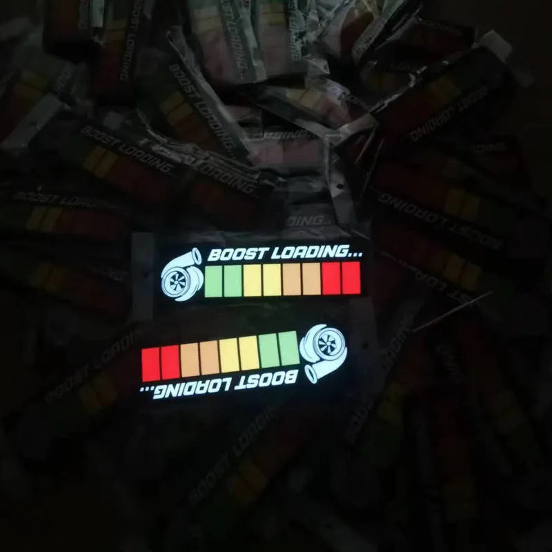 Electroluminescent car window sticker with white glow showing 0.5mm thickness and separate driver components