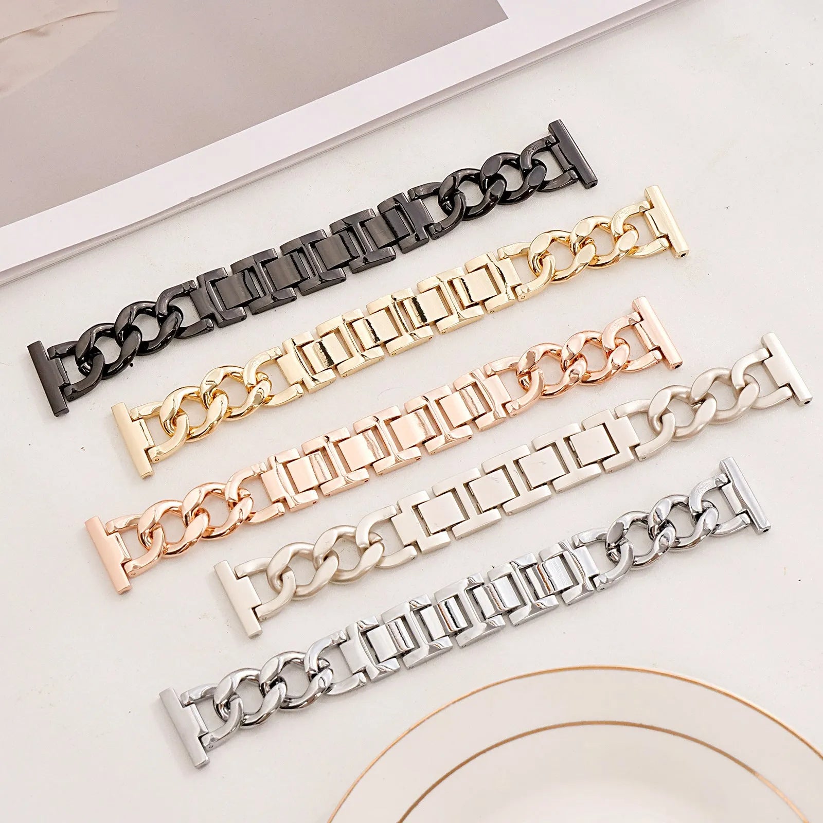 Metal denim chain link Apple Watch strap in silver, black, gold, rose gold and starlight colours.