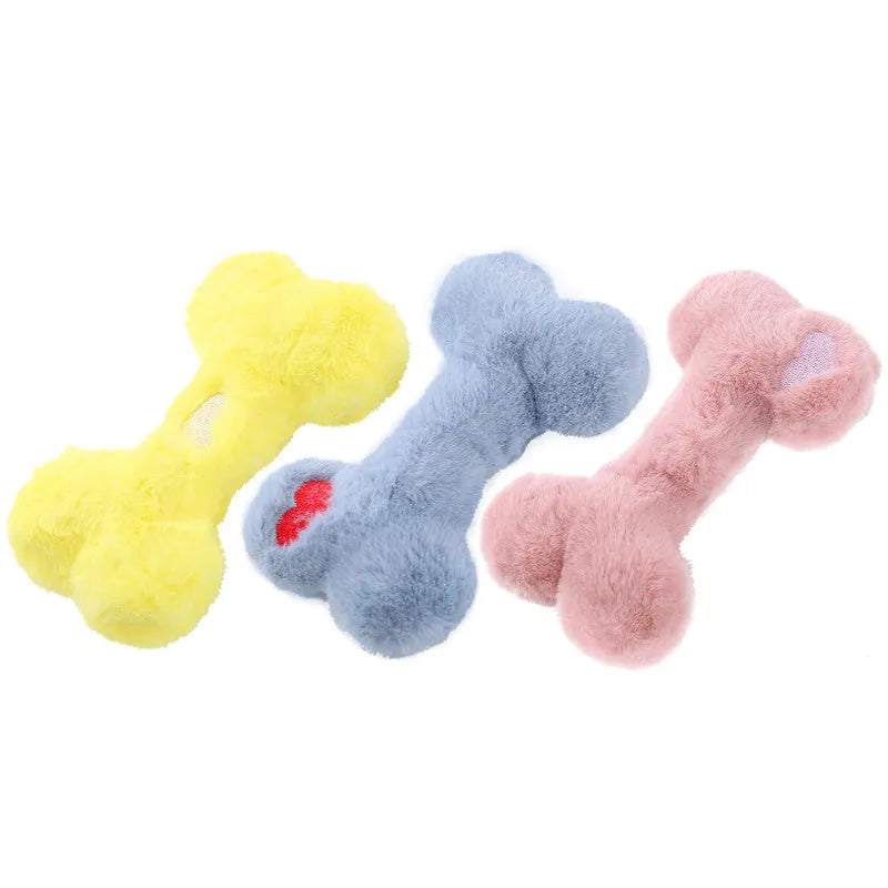 Cute plush love bone dog toy with a squeaker in blue, pink, and yellow colours.