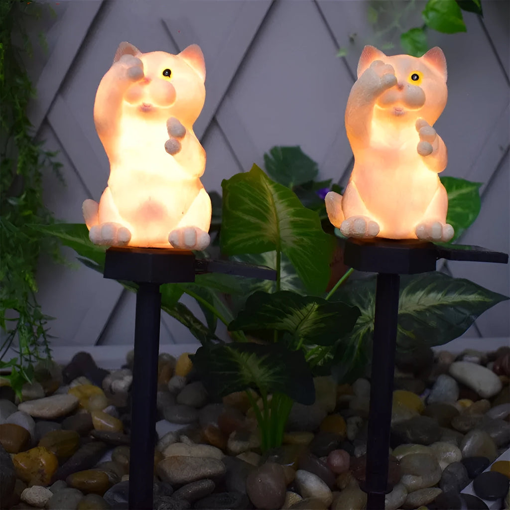 Brown or grey resin cat-shaped solar lawn light for garden and courtyard decoration.