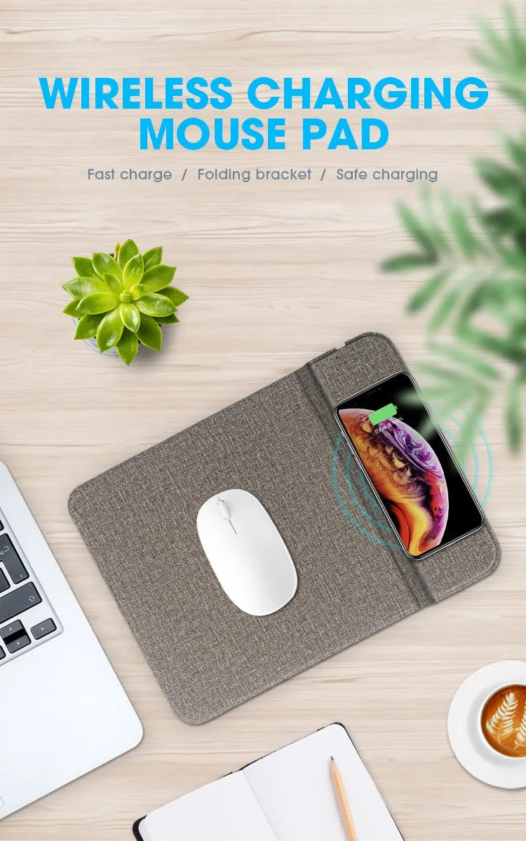 Foldable cloth phone holder with built-in wireless charging pad on a desk.