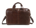 Brown leather business briefcase with visible cowhide pattern, measuring 18 inches with internal polyester cotton lining