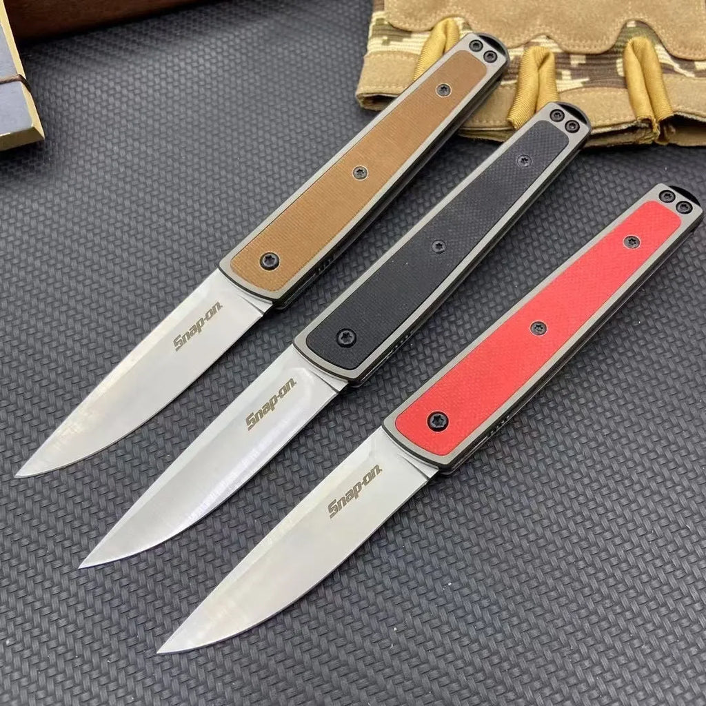 Folding fruit knife with stainless steel blade in black, brown, or red with measurements showing 17cm length
