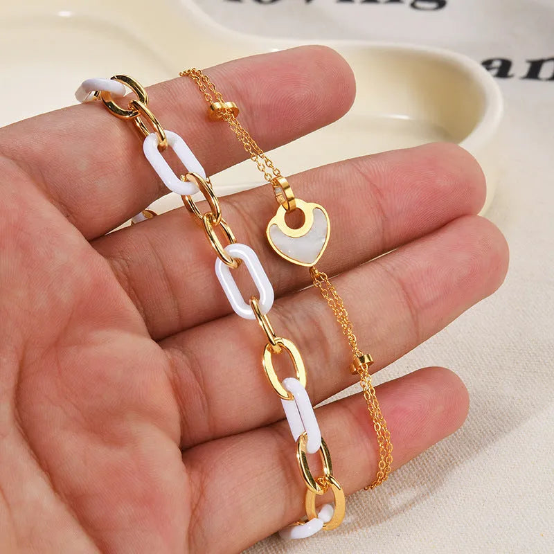 Women's stainless steel resin bracelet with double layers and heart shape design
