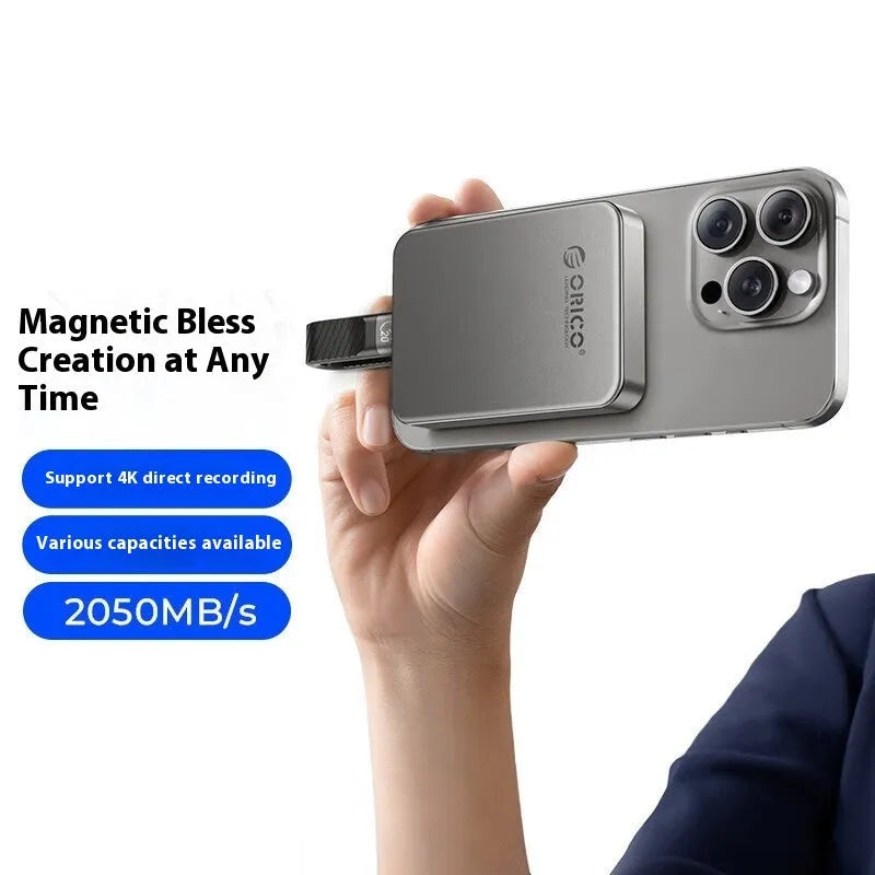 Grey ultra-thin magnetic mobile SSD with C to C cable and magnetic suction ring.